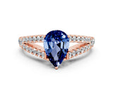 Rose gold Pear Cut Cut Split Shank Pave Diamond Engagement Ring with Four-Prong Setting