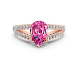 Rose gold Pear Cut Cut Split Shank Pave Diamond Engagement Ring with Four-Prong Setting