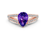Rose gold Pear Cut Cut Split Shank Pave Diamond Engagement Ring with Four-Prong Setting