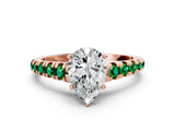 Rose gold Pear Cut Diamond Cathedral Solitaire Ring with Round with Emerald side stone Pavé Band