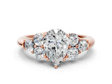 Rose gold Pear Cut Diamond Cluster Ring with Round Accent Stones and Prong Setting on a Classic Band_62