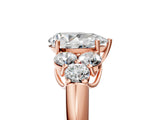 Rose gold Pear Cut Diamond Cluster Ring with Round Accent Stones and Prong Setting on a Classic Band_67
