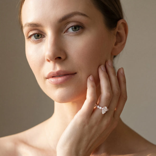 Rose gold Pear Cut Diamond Engagement Ring with Pavé Band and Four-Prong Setting