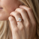 Rose gold Pear Cut Diamond Engagement Ring with Side Stone Accents and Four-Prong Setting_15