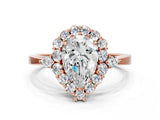 Rose gold Pear Cut Diamond Halo Ring with Pear Side Stones and Prong Setting_57