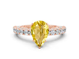 Rose gold Pear Cut Diamond Pavé Band Solitaire Ring with Prong Setting