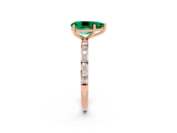 Rose gold Pear Cut Emerald Solitaire Ring with Round Pavé Shoulders and Prong Setting