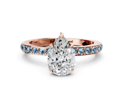 Rose gold Pear Cut Diamond Pavé Engagement Ring with Round with Aquamarine side stone Accents and Prong Setting