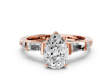 Rose gold Pear Cut Diamond Ring with Baguette Side Stones, Channel Set Band, and Four-Prong Setting_13