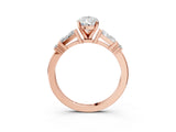 Rose gold Pear Cut Diamond Ring with Baguette Side Stones, Channel Set Band, and Four-Prong Setting_16