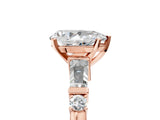 Rose gold Pear Cut Diamond Ring with Baguette Side Stones, Channel Set Band, and Four-Prong Setting_18
