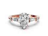 Rose gold Pear Cut Diamond Ring with Baguette Side Stones, Channel Set Band, and Four-Prong Setting_25