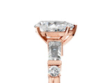 Rose gold Pear Cut Diamond Ring with Baguette Side Stones, Channel Set Band, and Four-Prong Setting_30