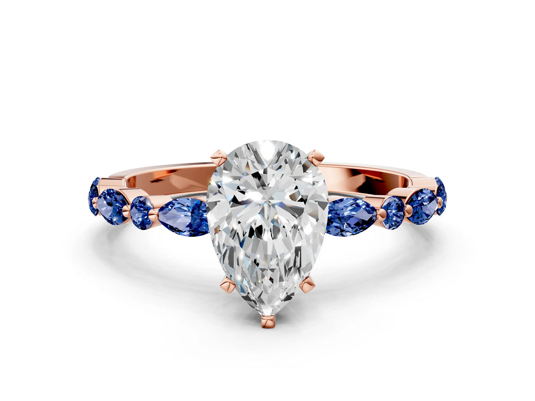 Rose gold Pear Cut Diamond Ring with Marquise and Round with Blue Sapphire side stone Side Stones and Four-Prong Setting_48