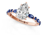 Rose gold Pear Cut Diamond Ring with Marquise and Round with Blue Sapphire side stone Side Stones and Four-Prong Setting_49
