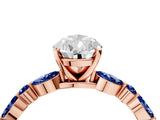 Rose gold Pear Cut Diamond Ring with Marquise and Round with Blue Sapphire side stone Side Stones and Four-Prong Setting_52
