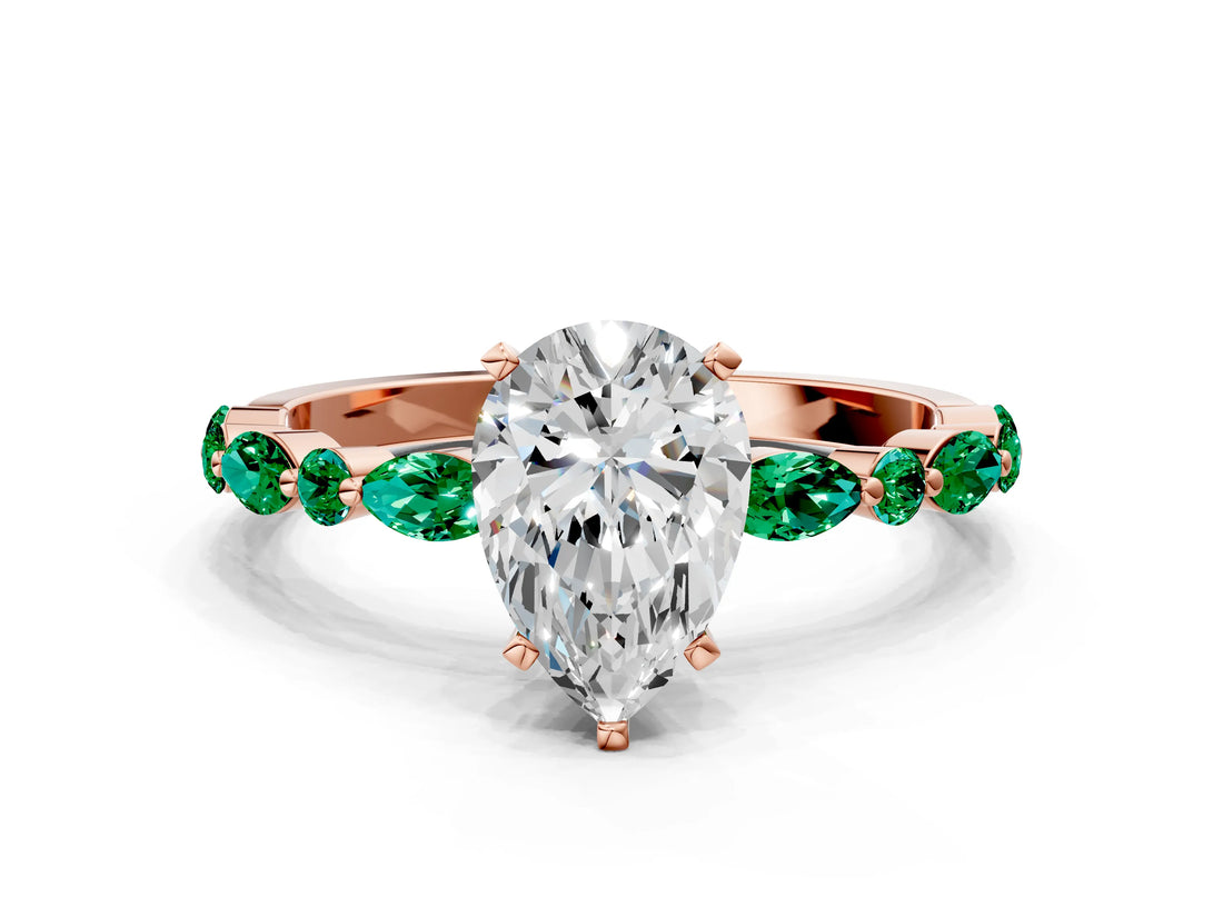 Rose gold Pear Cut Diamond Ring with Marquise and Round with Emerald side stone Side Stones and Four-Prong Setting_60