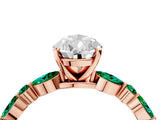 Rose gold Pear Cut Diamond Ring with Marquise and Round with Emerald side stone Side Stones and Four-Prong Setting_64