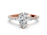 Rose gold Pear Cut Diamond Ring with Marquise and Round with Moissanite side stone Side Stones and Four-Prong Setting_60
