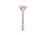 Rose gold Pear Cut Diamond Ring with Marquise and Round with Moissanite side stone Side Stones and Four-Prong Setting_62