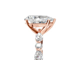 Rose gold Pear Cut Diamond Ring with Marquise and Round with Moissanite side stone Side Stones and Four-Prong Setting_65