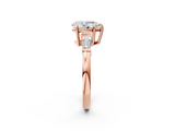 Rose gold Pear Cut Diamond Ring with Tapered Baguette Side Stones in Four-Prong Setting_18