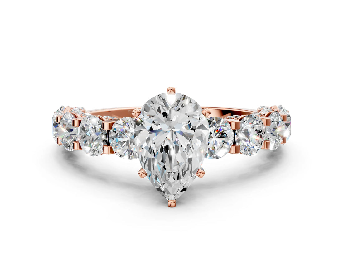Rose gold Pear Cut Diamond Side Stone Engagement Ring with Four-Prong Setting_24