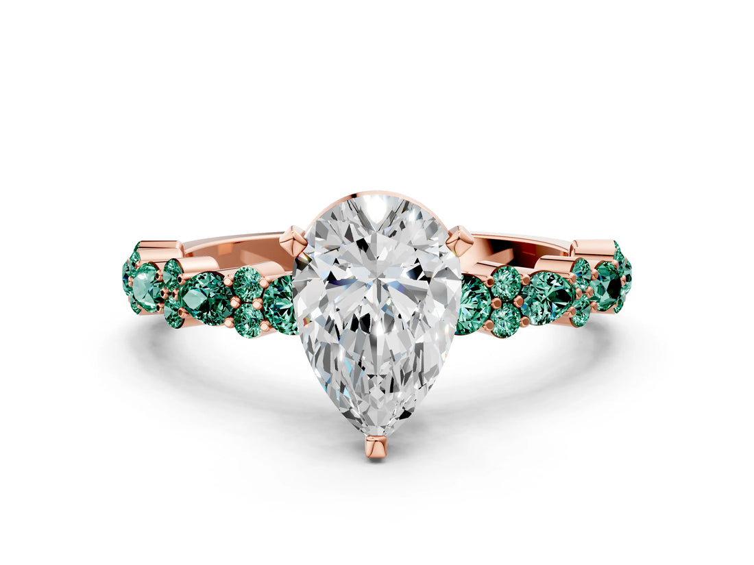 Rose gold Pear Cut Diamond Side Stone Solitaire Ring with Round with Green Sapphire side stone and Four-Prong Setting