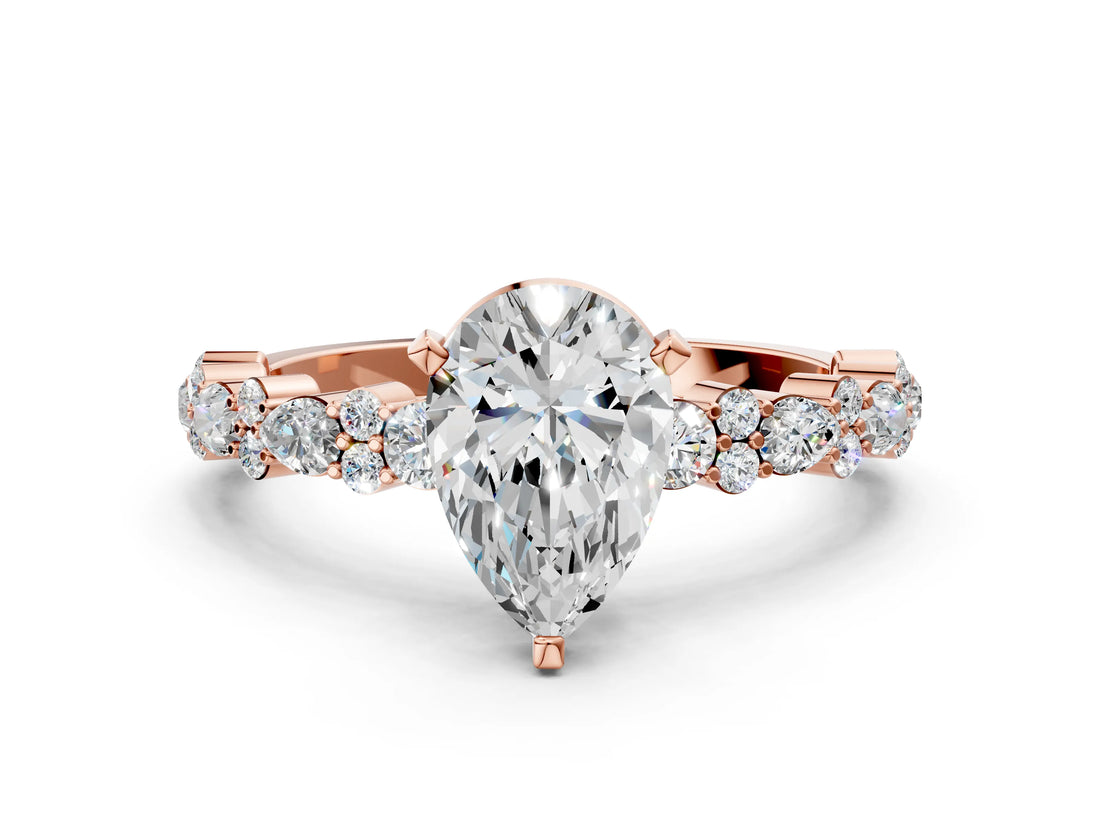 Rose gold Pear Cut Diamond Side Stone Solitaire Ring with Round with Moissanite side stone and Four-Prong Setting