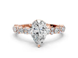 Rose gold Pear Cut Diamond Side Stone Solitaire Ring with Round with Moissanite side stone and Four-Prong Setting