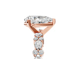 Rose gold Pear Cut Diamond Side Stone Solitaire Ring with Round with Moissanite side stone and Four-Prong Setting_5