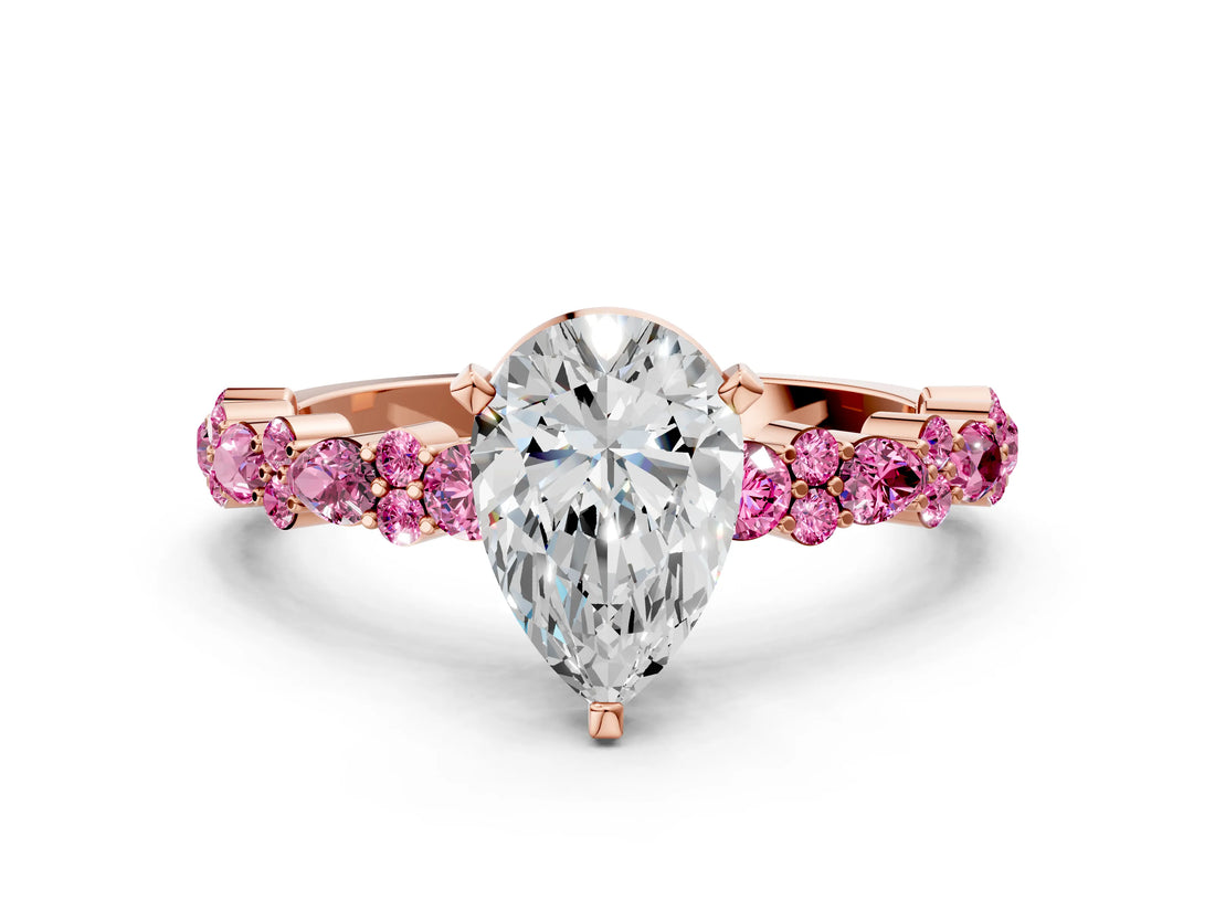 Rose gold Pear Cut Diamond Side Stone Solitaire Ring with Round with Pink Sapphire side stone and Four-Prong Setting