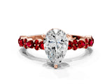 Rose gold Pear Cut Diamond Side Stone Solitaire Ring with Round with Ruby side stone and Four-Prong Setting