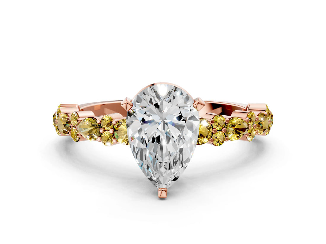 Rose gold Pear Cut Diamond Side Stone Solitaire Ring with Round with Yellow Sapphire side stone and Four-Prong Setting