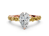 Rose gold Pear Cut Diamond Side Stone Solitaire Ring with Round with Yellow Sapphire side stone and Four-Prong Setting