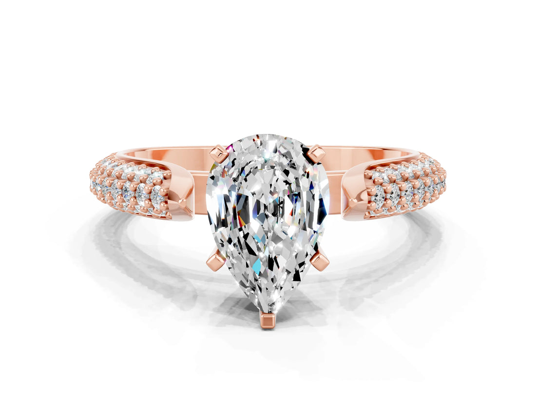 Rose gold Pear Cut Diamond Solitaire Engagement Ring with Pavé Band and Four-Prong Setting