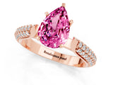 Rose gold Pear Cut Diamond Solitaire Engagement Ring with Pavé Band and Four-Prong Setting_1