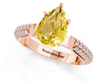 Rose gold Pear Cut Diamond Solitaire Engagement Ring with Pavé Band and Four-Prong Setting_1