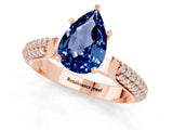 Rose gold Pear Cut Diamond Solitaire Engagement Ring with Pavé Band and Four-Prong Setting_1