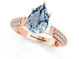 Rose gold Pear Cut Diamond Solitaire Engagement Ring with Pavé Band and Four-Prong Setting_1