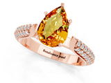 Rose gold Pear Cut Diamond Solitaire Engagement Ring with Pavé Band and Four-Prong Setting_1