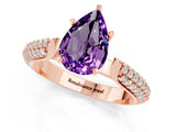 Rose gold Pear Cut Diamond Solitaire Engagement Ring with Pavé Band and Four-Prong Setting_1