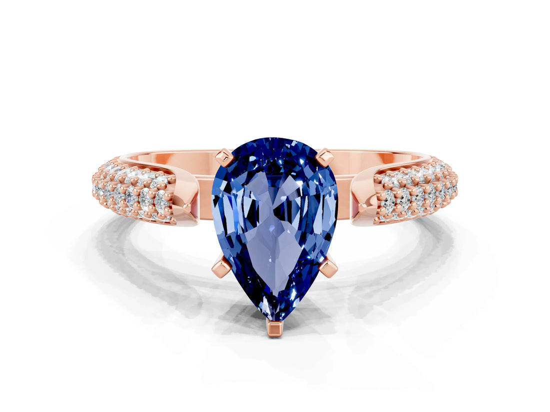 Rose gold Pear Cut Diamond Solitaire Engagement Ring with Pavé Band and Four-Prong Setting