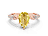 Rose gold Pear Cut Diamond Solitaire Engagement Ring with Pavé Band and Four-Prong Setting
