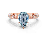 Rose gold Pear Cut Diamond Solitaire Engagement Ring with Pavé Band and Four-Prong Setting