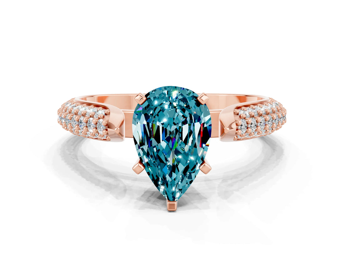 Rose gold Pear Cut Diamond Solitaire Engagement Ring with Pavé Band and Four-Prong Setting