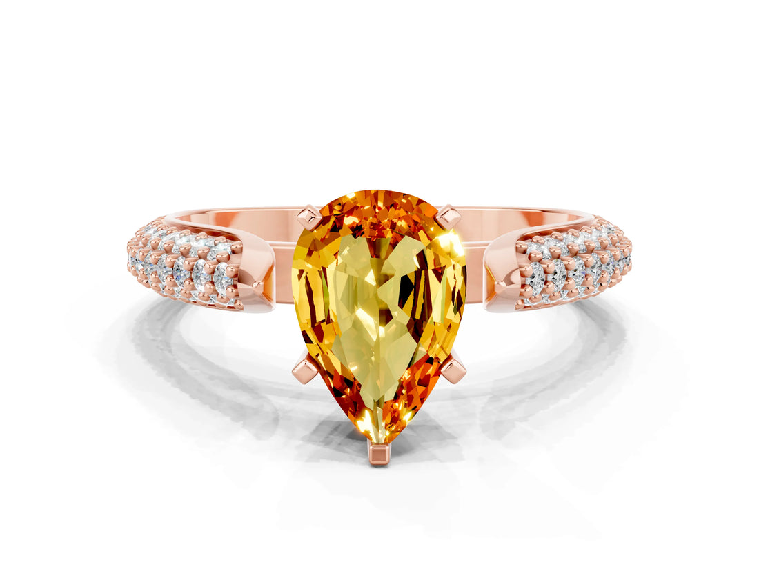 Rose gold Pear Cut Diamond Solitaire Engagement Ring with Pavé Band and Four-Prong Setting
