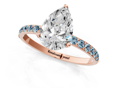 Rose gold Pear Cut Diamond Solitaire Engagement Ring with Round with Aquamarine side stone Pavé Band and Prong Setting_1