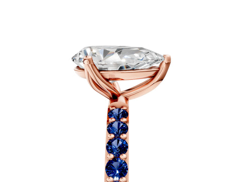 Rose gold Pear Cut Diamond Solitaire Engagement Ring with Round with Blue Sapphire side stone Pavé Band and Prong Setting_5