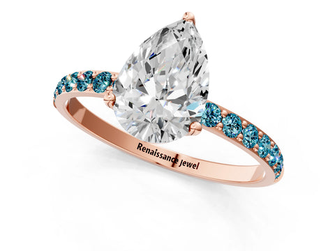 Rose gold Pear Cut Diamond Solitaire Engagement Ring with Round with Blue Topaz side stone Pavé Band and Prong Setting_1